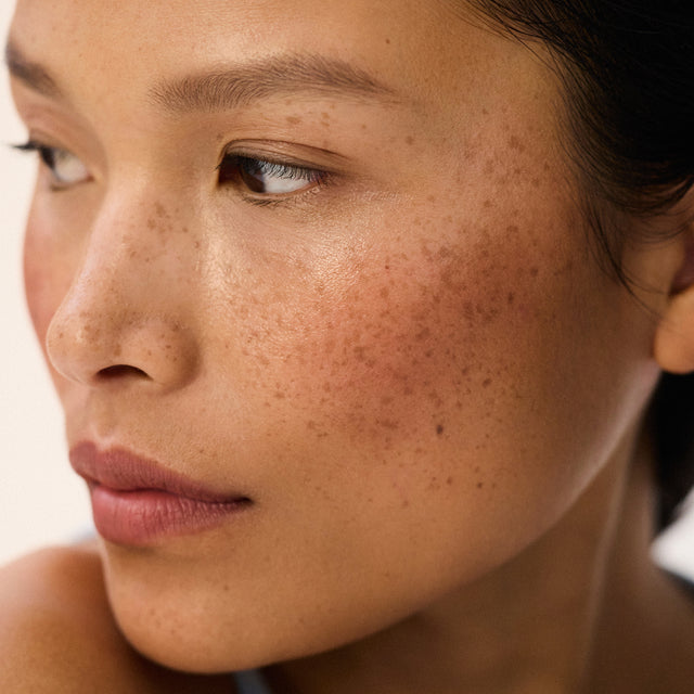 Medium skin tone model wearing Impressionist Multistick in Intuition